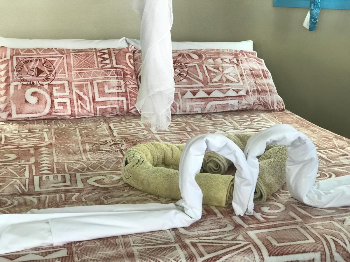 Litia Sini Beach Fales Lalomanu Bagian luar foto